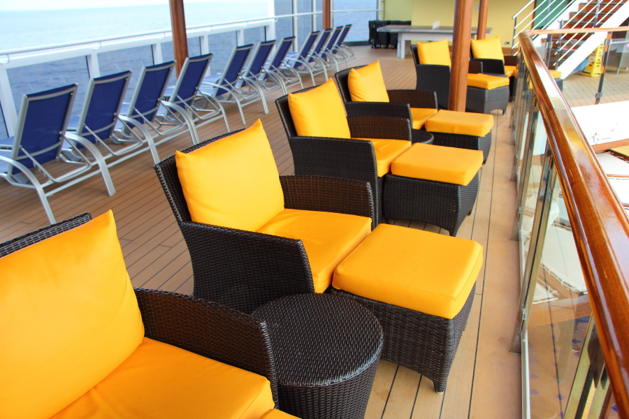 Comfortable outdoor furniture on Carnival Breeze