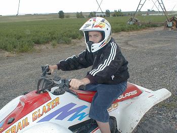 Jeff riding the ATV