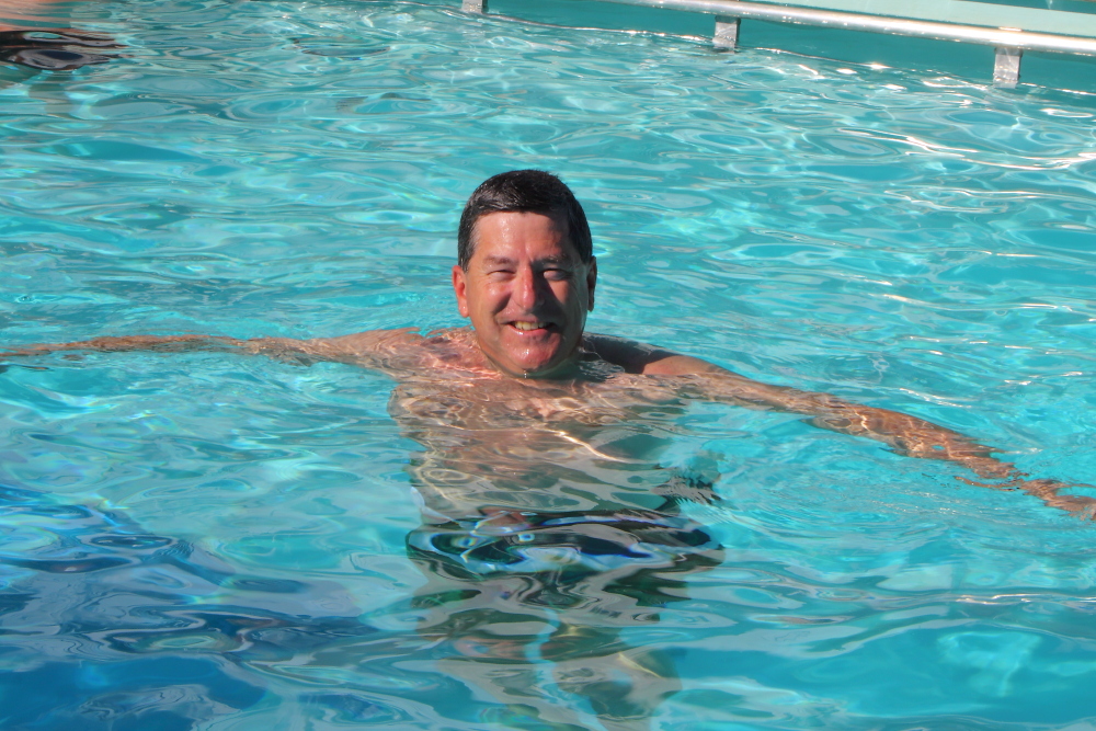 Jim Zimmerlin on vacation in swimming pool