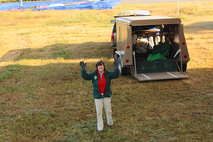 Lucinda waves as our balloon begins to fly away