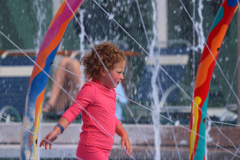 girl playing at Independence Of The Seas water playground