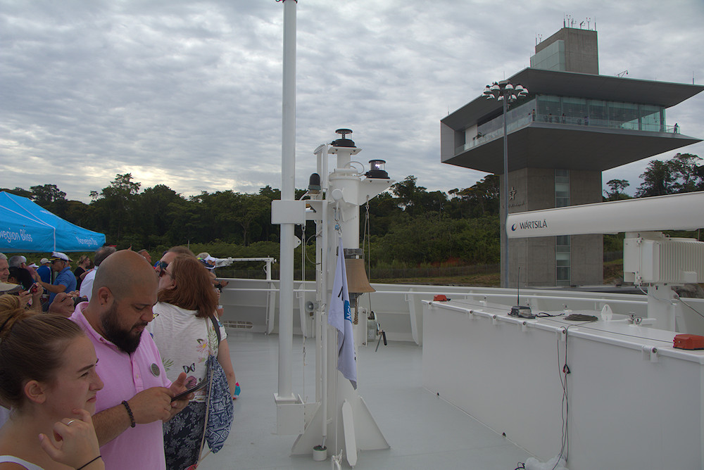 Norwegian Bliss and Panama canal control tower