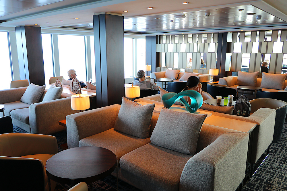 Comfy furniture in the observation lounge on Norwegian Joy